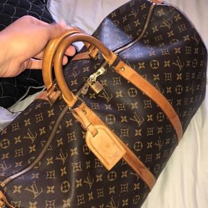 Louis Vuitton duffle vintage. NEED GONE ASAP.